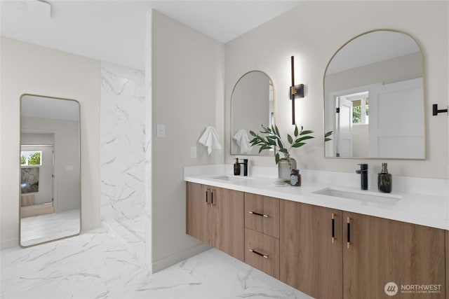 5041 Bowen Pl S, Seattle, WA 98118 - bathroom with marble look tiles, double vanity, and healthy amount of natural light