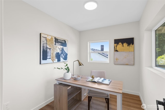 5041 Bowen Pl S, Seattle, WA 98118 - office area with baseboards and wood finished floors