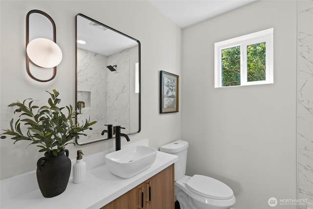5041 Bowen Pl S, Seattle, WA 98118 - bathroom with vanity, toilet, and a shower
