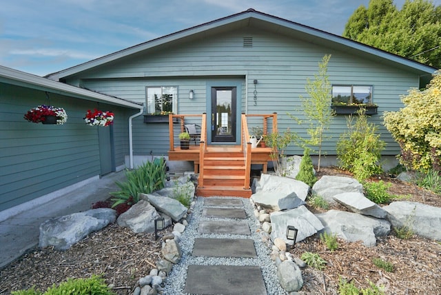 1083 N Vista Del Monte St, Camano Island, WA 98282 - view of front of home featuring a wooden deck
