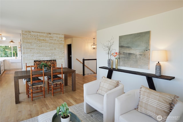 1083 N Vista Del Monte St, Camano Island, WA 98282 - living area featuring wood finished floors and a fireplace
