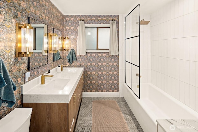 1083 N Vista Del Monte St, Camano Island, WA 98282 - full bath with double vanity, shower / washtub combination, baseboards, toilet, and wallpapered walls