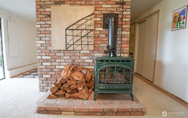 1083 N Vista Del Monte St, Camano Island, WA 98282 - detailed view of a wood stove, carpet floors, and baseboards