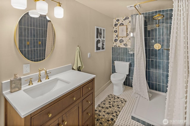1083 N Vista Del Monte St, Camano Island, WA 98282 - full bathroom featuring vanity, toilet, tiled shower, and tile patterned floors
