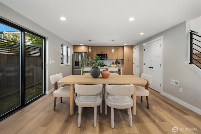 3720 36th Ave SW Unit B, Seattle, WA 98126 - dining area with recessed lighting, light wood finished floors, and baseboards
