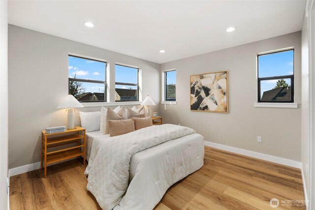 3720 36th Ave SW Unit B, Seattle, WA 98126 - bedroom with light wood finished floors, baseboards, and recessed lighting