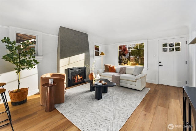 3722 36th Ave SW, Seattle, WA 98126 - living area with a tiled fireplace and wood finished floors
