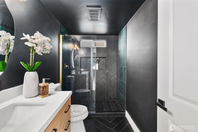 3722 36th Ave SW, Seattle, WA 98126 - full bathroom with vanity, toilet, tile patterned flooring, and a walk in shower