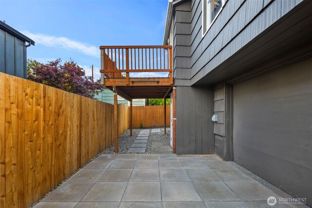 3722 36th Ave SW, Seattle, WA 98126 - fenced backyard with a patio area