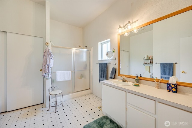 424 Maranatha, Kelso, WA 98626 - bathroom with tile patterned floors, a stall shower, and vanity