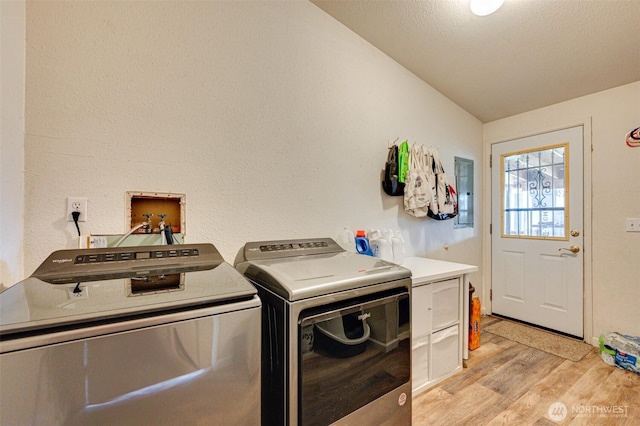 424 Maranatha, Kelso, WA 98626 - laundry area with washing machine and dryer and light wood-style flooring