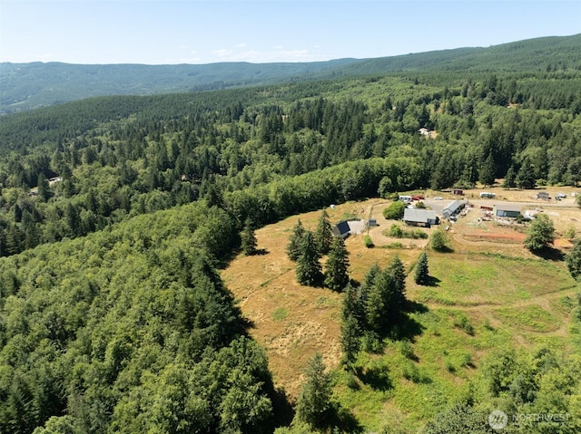 424 Maranatha, Kelso, WA 98626 - drone / aerial view of a heavily wooded area and a mountain backdrop