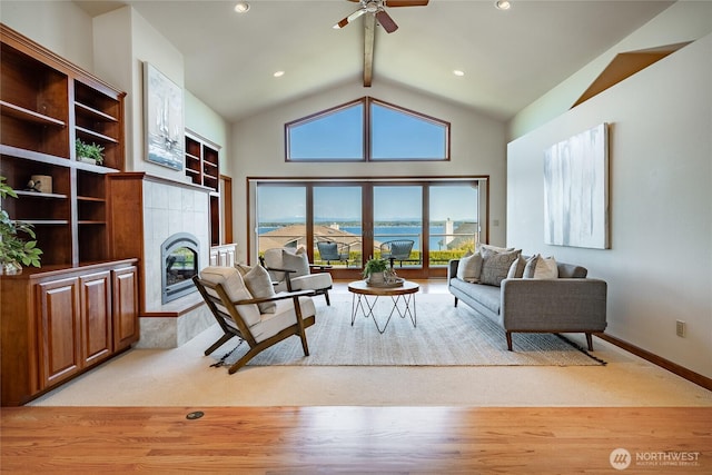 8022 Makah Rd, Blaine, WA 98230 - living room with a fireplace, ceiling fan, light carpet, baseboards, and recessed lighting