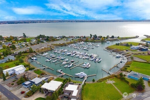 8022 Makah Rd, Blaine, WA 98230 - drone / aerial view of a marina and a nearby body of water