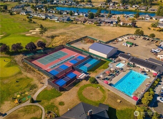 8022 Makah Rd, Blaine, WA 98230 - bird's eye view of a large body of water, a pool area, and a golf club
