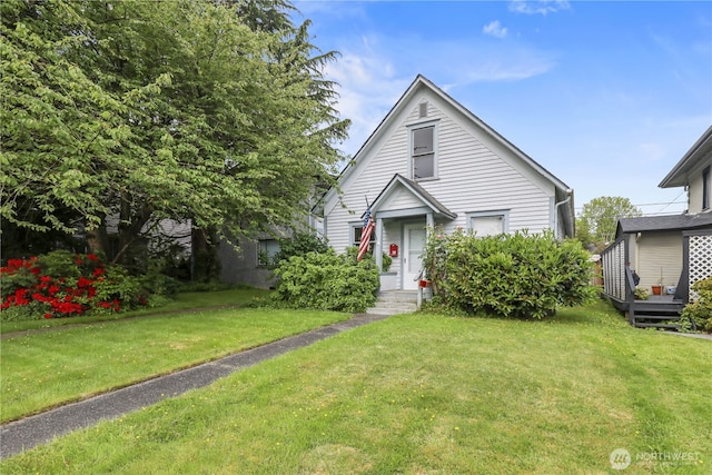 3718 Wetmore Ave, Everett, WA 98201 - bungalow-style house with a front lawn and a wooden deck