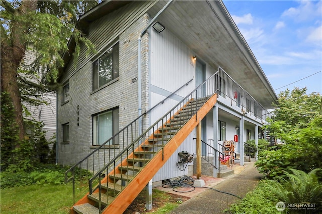 3718 Wetmore Ave, Everett, WA 98201 - view of property exterior with stairway and brick siding