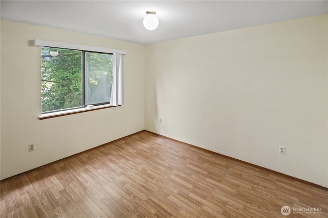 3718 Wetmore Ave, Everett, WA 98201 - spare room with light wood-style floors and baseboards