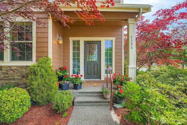 4306 Maple St SE, Olympia, WA 98501 - property entrance featuring a porch and stone siding