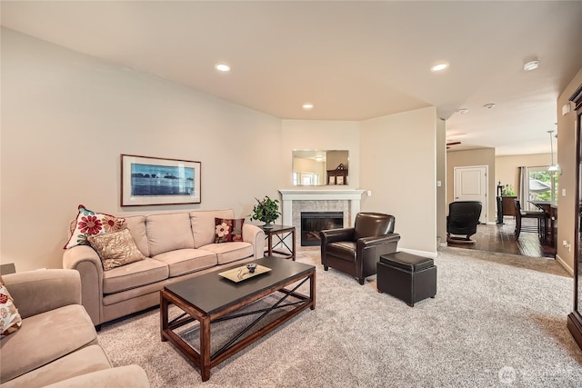 4306 Maple St SE, Olympia, WA 98501 - living room featuring a fireplace, recessed lighting, and light carpet