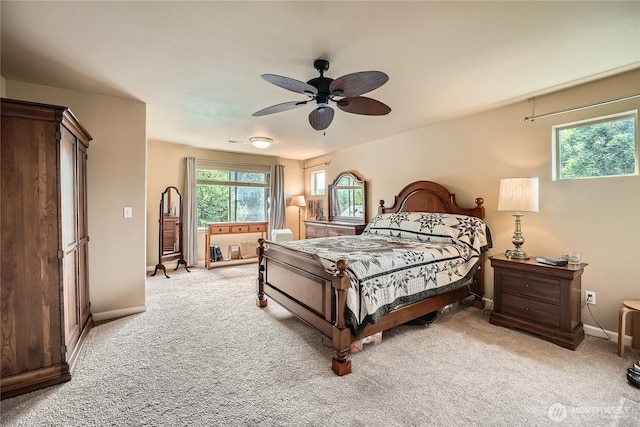 4306 Maple St SE, Olympia, WA 98501 - bedroom with light colored carpet, multiple windows, and ceiling fan