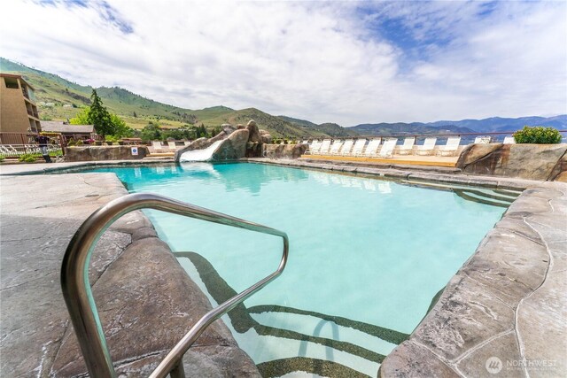322 W Woodin Ave Unit 620, Chelan, WA 98816 - view of pool with a water slide and a mountain view