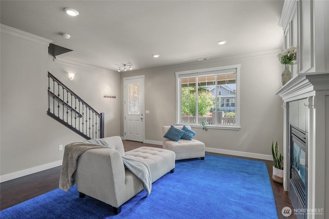 2413 Peabody St, Bellingham, WA 98225 - living room featuring crown molding, stairs, baseboards, recessed lighting, and dark wood-type flooring
