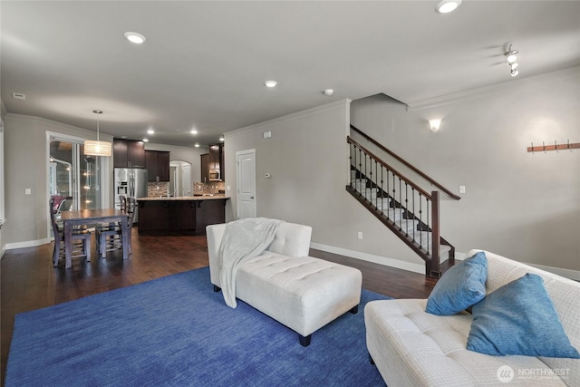 2413 Peabody St, Bellingham, WA 98225 - living area with crown molding, dark wood finished floors, stairs, recessed lighting, and baseboards