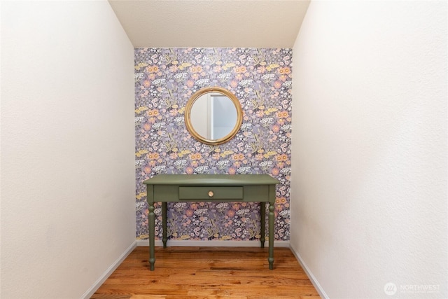 19709 Whiteman Cove Rd SW, Longbranch, WA 98351 - detailed view of wood finished floors and wallpapered walls