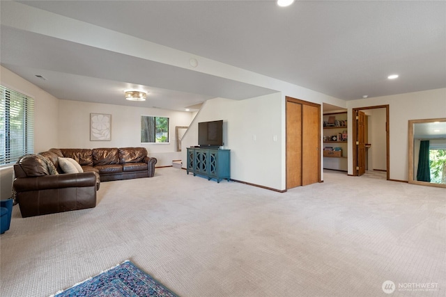 19709 Whiteman Cove Rd SW, Longbranch, WA 98351 - living room with light colored carpet and recessed lighting