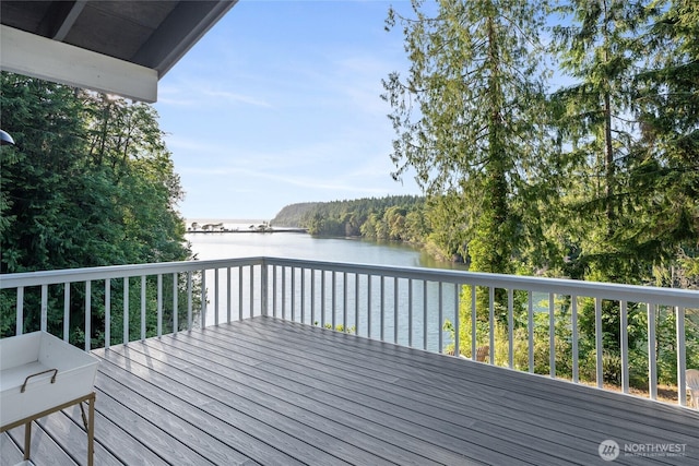 19709 Whiteman Cove Rd SW, Longbranch, WA 98351 - wooden deck with a water view