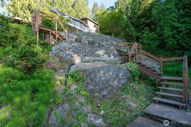 19709 Whiteman Cove Rd SW, Longbranch, WA 98351 - view of yard featuring stairway and a wooden deck