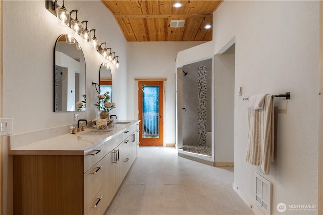 435 Thumper Ln, Camano Island, WA 98282 - full bathroom featuring wood ceiling, double vanity, a stall shower, lofted ceiling, and recessed lighting