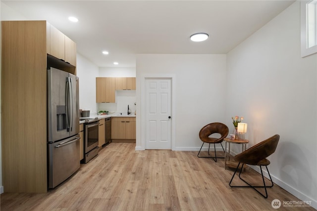 435 Thumper Ln, Camano Island, WA 98282 - living area featuring light wood finished floors, baseboards, and recessed lighting