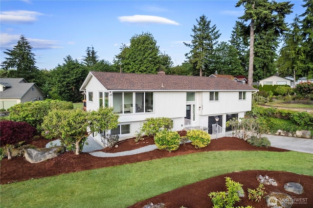 28830 11th Ave S, Federal Way, WA 98003 - raised ranch featuring roof with shingles, a chimney, and a front yard