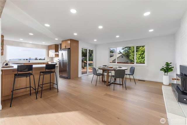 28830 11th Ave S, Federal Way, WA 98003 - dining space with plenty of natural light, light wood finished floors, recessed lighting, and baseboards