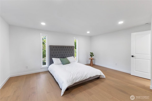 28830 11th Ave S, Federal Way, WA 98003 - bedroom featuring multiple windows, light wood-type flooring, baseboards, and recessed lighting
