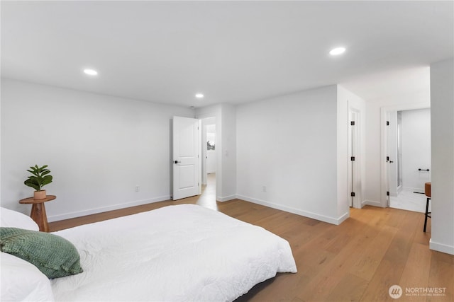 28830 11th Ave S, Federal Way, WA 98003 - bedroom featuring light wood-style floors, recessed lighting, and baseboards