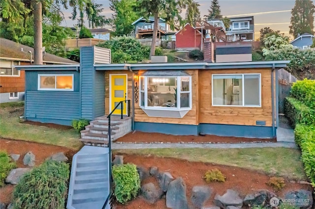 10209 65th Ave S, Seattle, WA 98178 - view of front facade featuring a chimney and crawl space