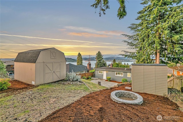 10209 65th Ave S, Seattle, WA 98178 - yard at dusk featuring a patio
