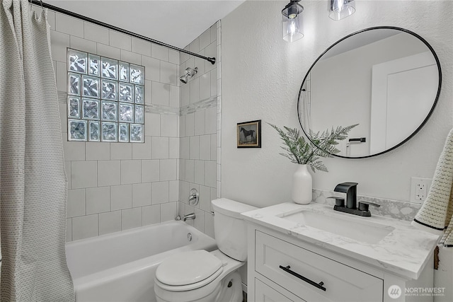 10209 65th Ave S, Seattle, WA 98178 - full bath with vanity, toilet, shower / tub combo with curtain, and a textured wall