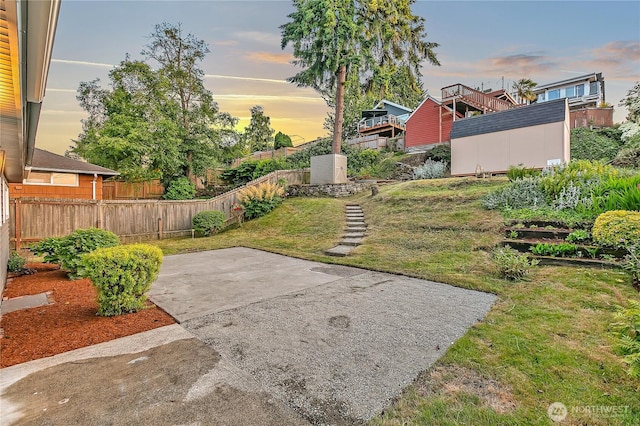 10209 65th Ave S, Seattle, WA 98178 - yard at dusk featuring a patio