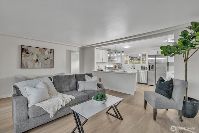 10209 65th Ave S, Seattle, WA 98178 - living room featuring light wood-style floors