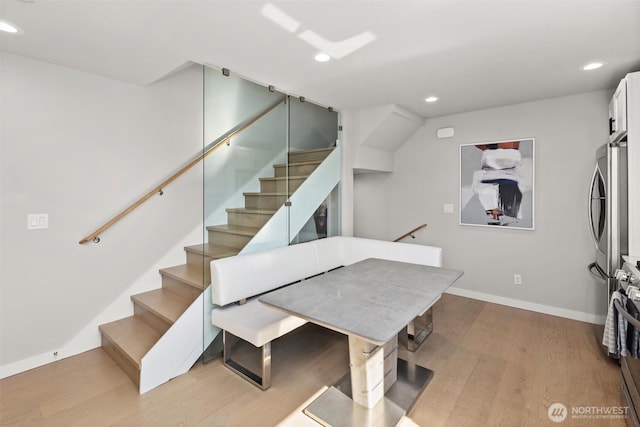 3638 36th Ave S Unit D, Seattle, WA 98144 - dining space with wood finished floors, stairs, recessed lighting, and baseboards