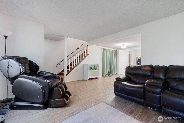 1801 Evergreen Park Ct SW Unit 8, Olympia, WA 98502 - living room with wood finished floors, stairway, and baseboards