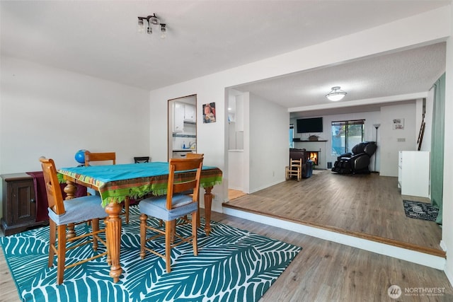 1801 Evergreen Park Ct SW Unit 8, Olympia, WA 98502 - dining room with wood finished floors