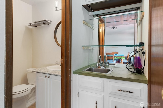 1801 Evergreen Park Ct SW Unit 8, Olympia, WA 98502 - bathroom featuring vanity and toilet