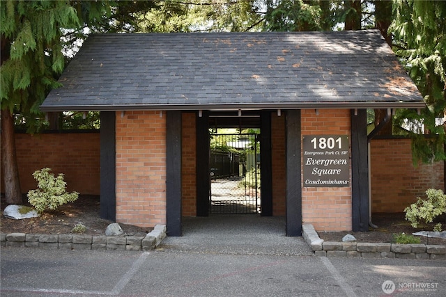 1801 Evergreen Park Ct SW Unit 8, Olympia, WA 98502 - view of outbuilding featuring a gate