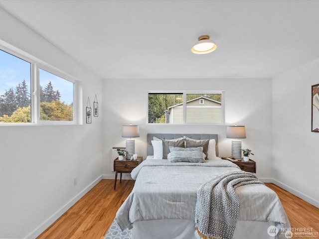 8421 240th St SW, Edmonds, WA 98020 - bedroom with baseboards and light wood-style flooring