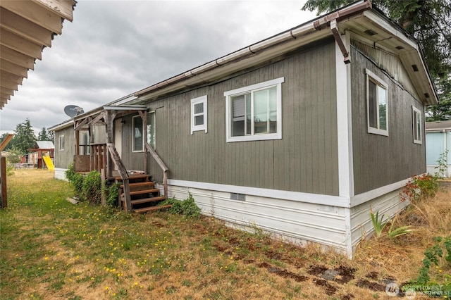 7503 189th Street Ct E Unit 12, Puyallup, WA 98375 - view of side of property with a yard